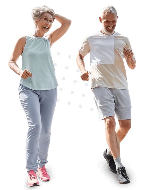 Happy senior couple running together